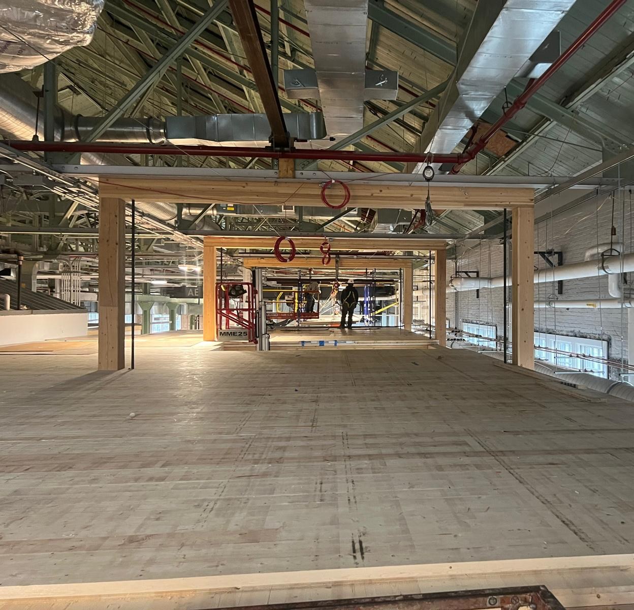 Timber frame and overhead services in place on an Integral floor, before finishes