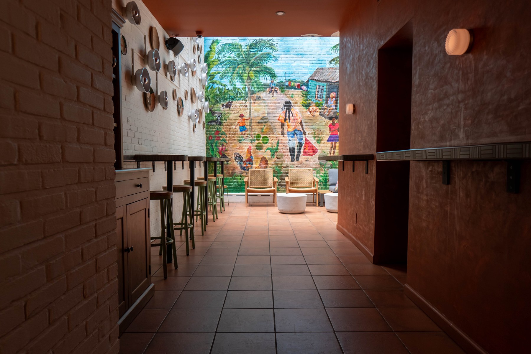 Brick corridor to the garden dining room, Jumieka Grand